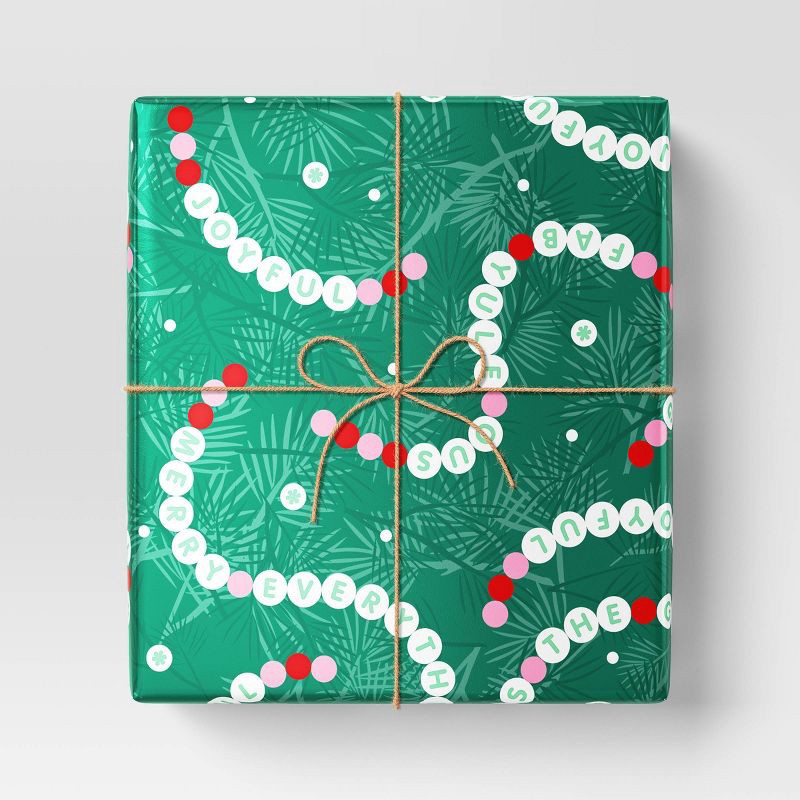 slide 2 of 3, 30" 55 sq ft Christmas Roll Wrap Seasonal Bracelet on Green - Wondershop™, 55 sq ft