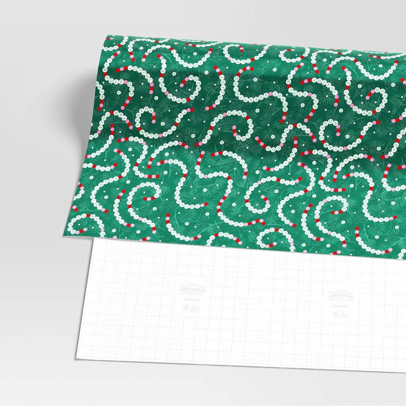 slide 3 of 3, 30" 55 sq ft Christmas Roll Wrap Seasonal Bracelet on Green - Wondershop™, 55 sq ft