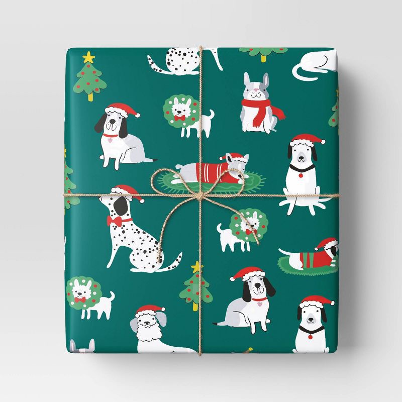 slide 2 of 3, 30" 50 sq ft Christmas Roll Wrap Illustrated Dogs on Green - Wondershop™, 50 sq ft