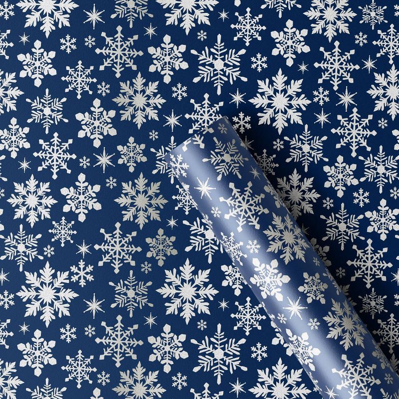 slide 1 of 3, 30" 25 sq ft Christmas Roll Wrap White Snowflakes on Blue - Wondershop™, 25 sq ft