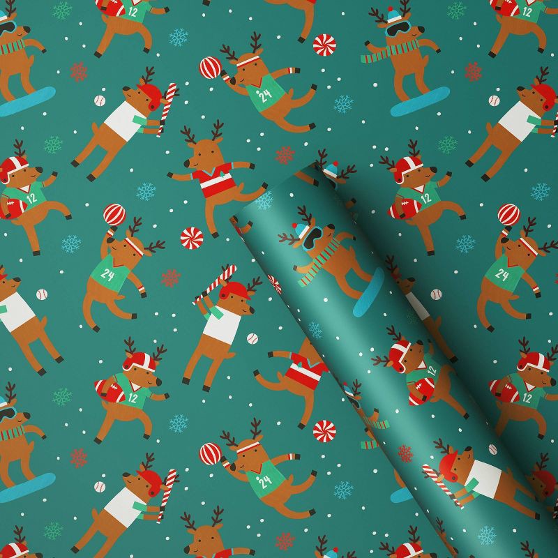 slide 1 of 3, 30" 50 sq ft Christmas Roll Wrap Reindeer Games on Green - Wondershop™, 50 sq ft