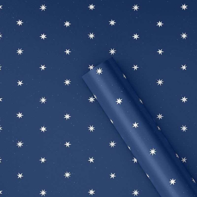 slide 1 of 3, 30" 25 sq ft Christmas Roll Wrap White Stars on Blue - Wondershop™, 25 sq ft