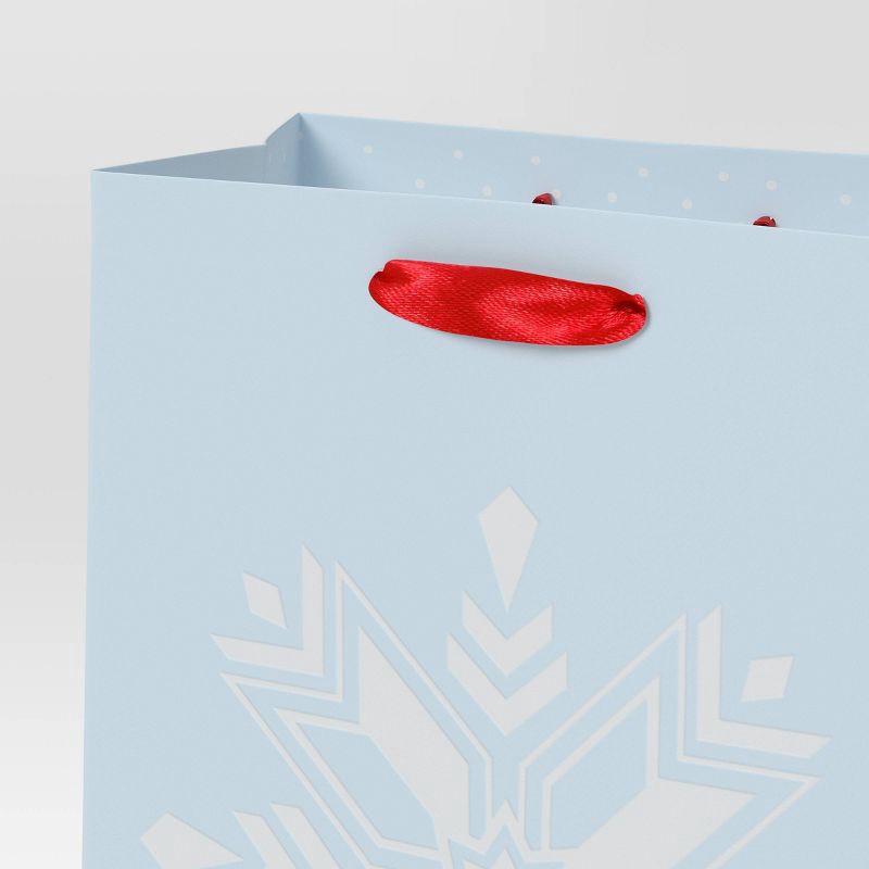 slide 3 of 3, White Snowflake on Blue Petite Christmas Gift Bag - Wondershop™, 1 ct