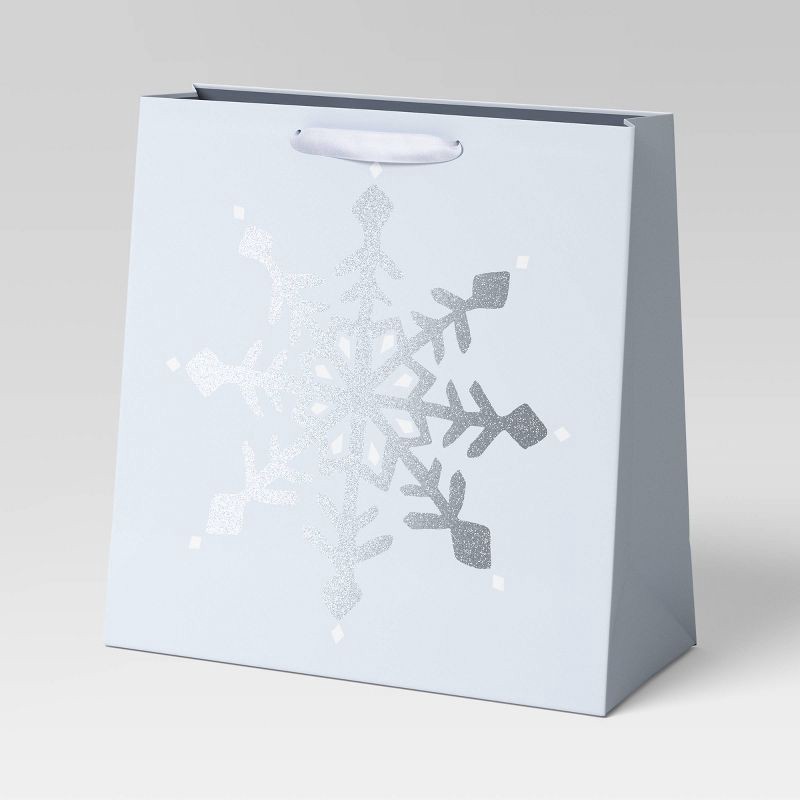 slide 1 of 3, Snowflake on Blue Large Square Christmas Gift Bag - Wondershop™, 1 ct