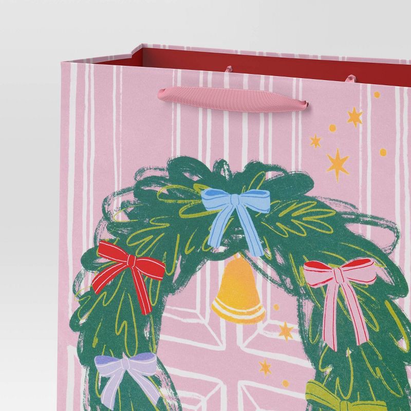 slide 3 of 3, Christmas Humble Cheer XL Cub Wreath on Pink Door - Wondershop™, 1 ct