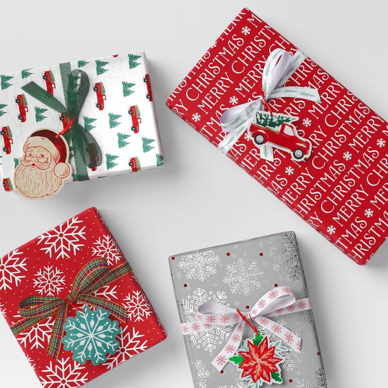 slide 2 of 3, 16ct Christmas Tie-On Gift Tags Truck/Snowflake/Poinsettia/Santa - Wondershop™, 16 ct