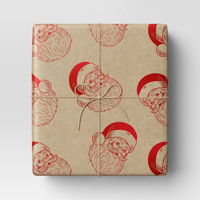 slide 2 of 3, 30" 25 sq ft Christmas Roll Wrap Santa Heads on Kraft - Wondershop™, 25 sq ft