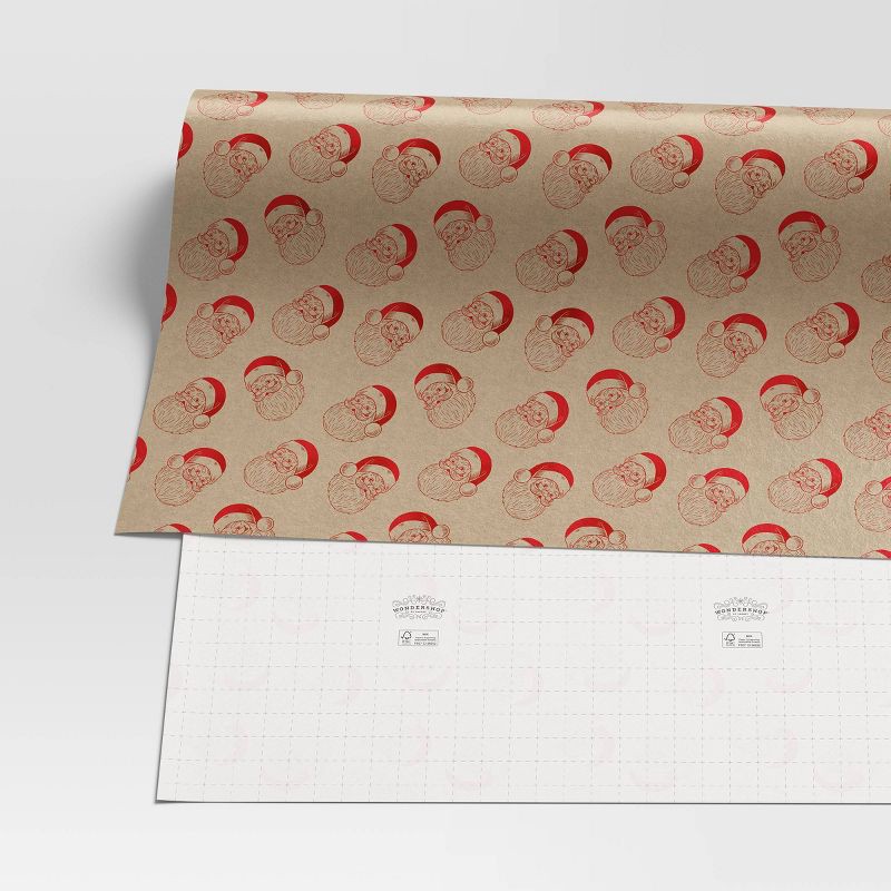 slide 3 of 3, 30" 25 sq ft Christmas Roll Wrap Santa Heads on Kraft - Wondershop™, 25 sq ft