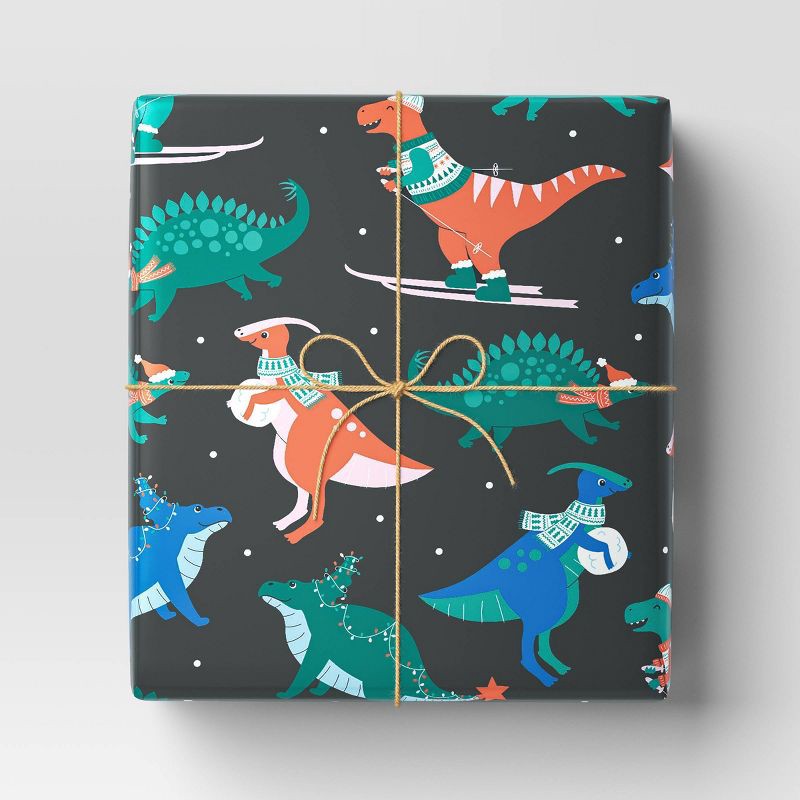 slide 2 of 3, 30" 50 sq ft Christmas Roll Wrap Dinosaurs on Black - Wondershop™, 50 sq ft