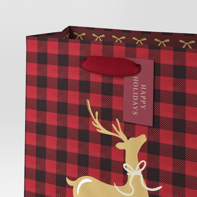 slide 3 of 3, Reindeer on Plaid Cub Christmas Gift Bag - Wondershop™, 1 ct