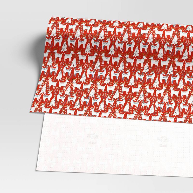 slide 3 of 3, 30" 20 sq ft Christmas Roll Wrap Scandinavian Trees and Deer on Red - Wondershop™, 20 sq ft