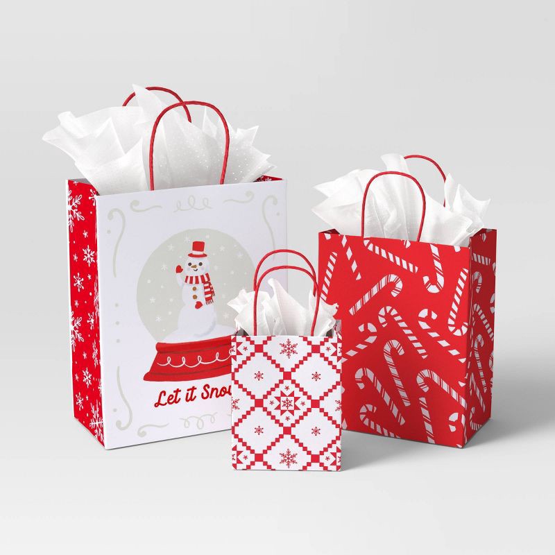 slide 2 of 5, 3ct Snowflakes and Candy Canes Large/Cub/Petite Christmas Gift Bags - Wondershop™, 3 ct