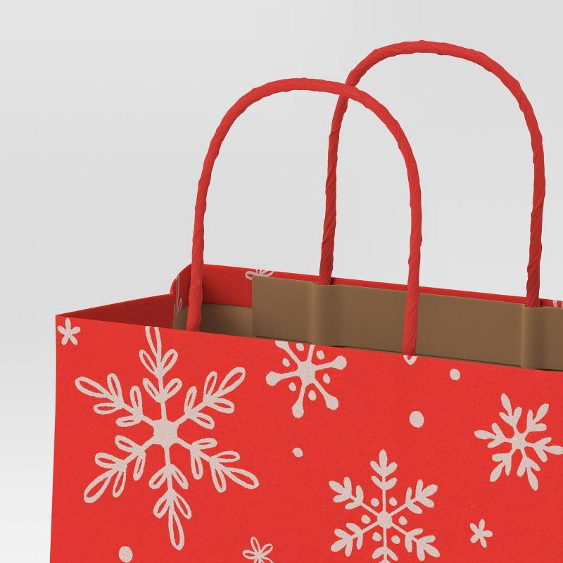 slide 4 of 4, 2ct Snowflake and Snowman Cub Christmas Gift Bags - Wondershop™, 2 ct