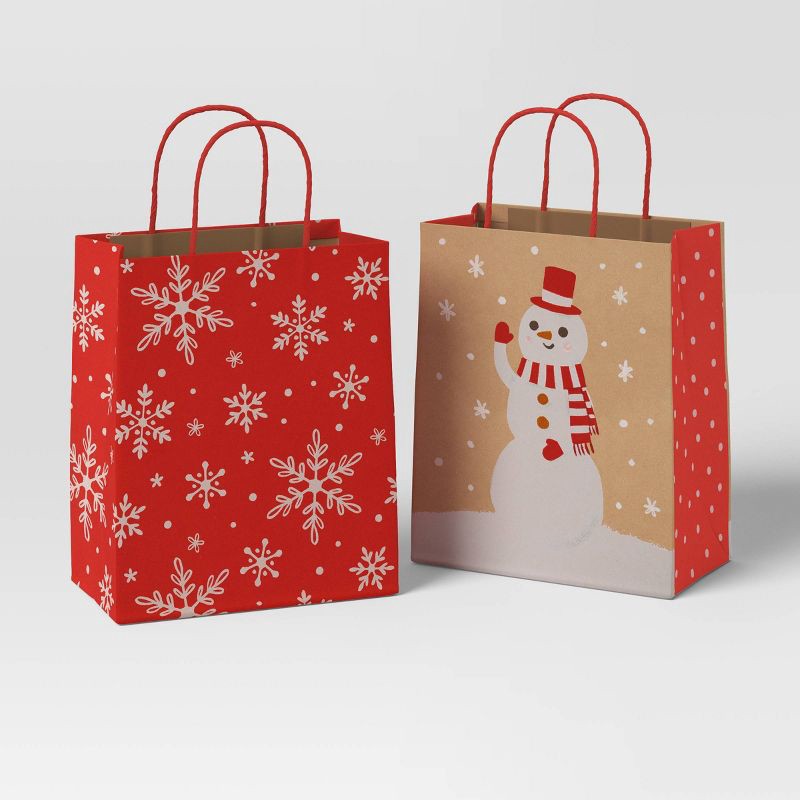 slide 1 of 4, 2ct Snowflake and Snowman Cub Christmas Gift Bags - Wondershop™, 2 ct