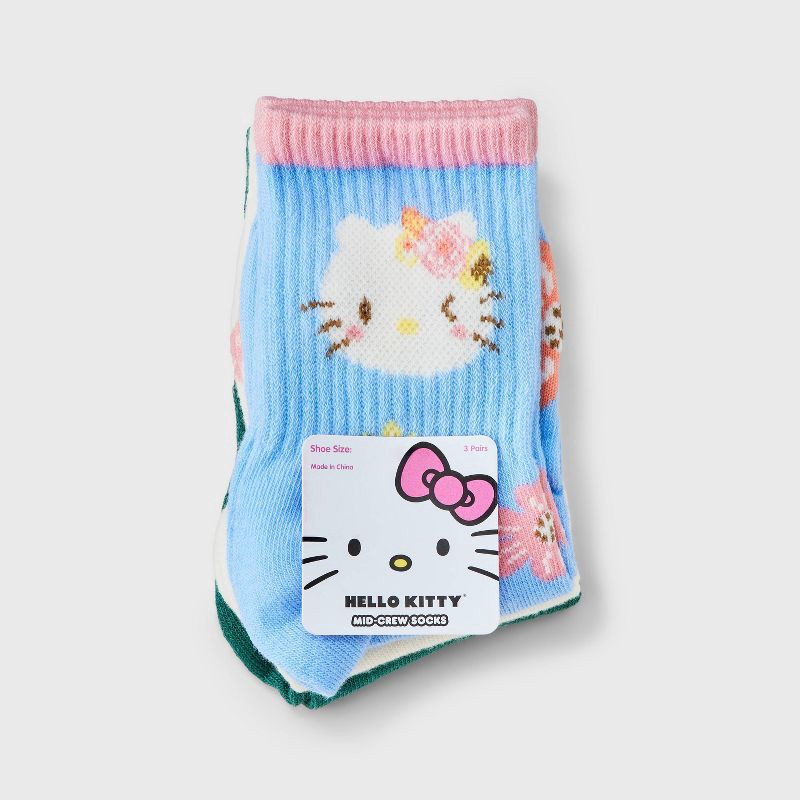 slide 2 of 3, Girls' Hello Kitty 3pk Mid Crew Socks - Blue Cream Green S/M, 3 ct
