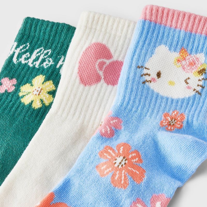 slide 3 of 3, Girls' Hello Kitty 3pk Mid Crew Socks - Blue Cream Green S/M, 3 ct