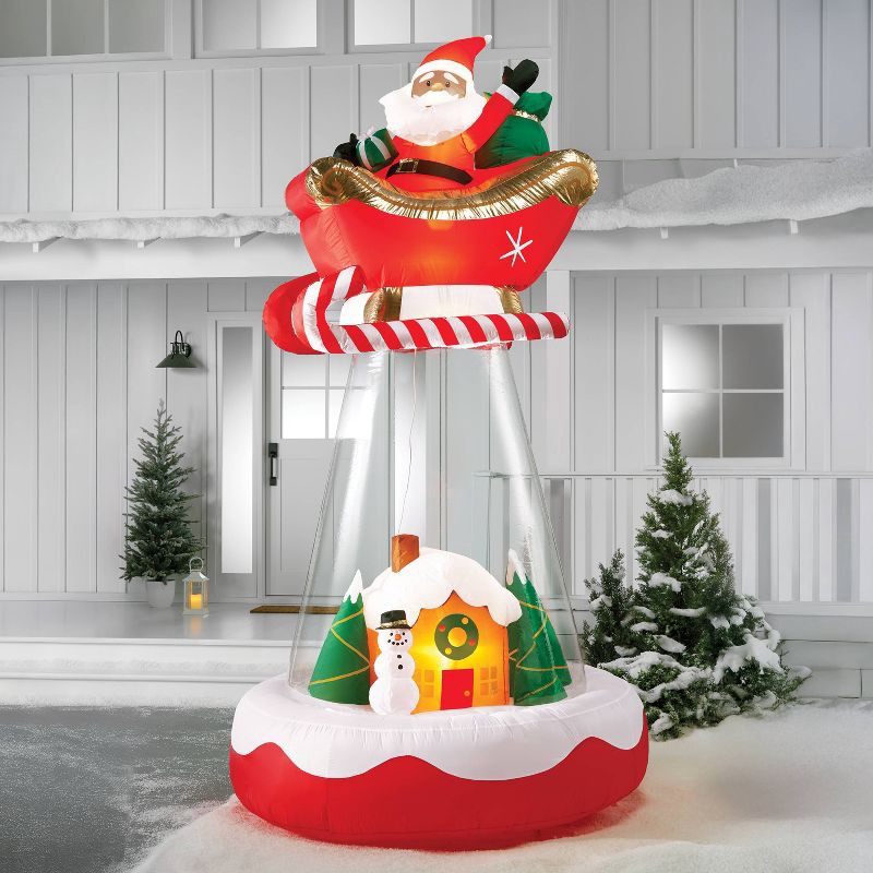 slide 2 of 4, 10' Christmas Indoor/Outdoor Lighted Inflatable Santa in Sleigh Over the House - Wondershop™, 1 ct