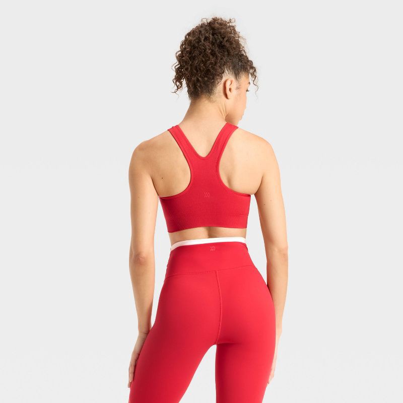slide 2 of 4, Women's Seamless Medium Support Racerback Sports Bra - All In Motion™ Red XS, 1 ct