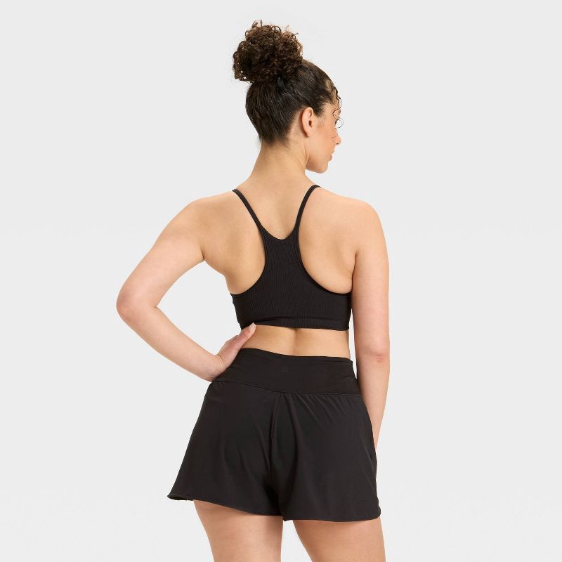 slide 2 of 3, Women's Seamless Ribbed Light Support Sports Bra - All In Motion™ Black S, 1 ct
