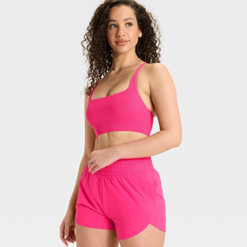 slide 3 of 3, Women's Seamless Ribbed Light Support Sports Bra - All In Motion™ Berry Pink L, 1 ct