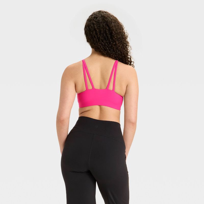slide 2 of 3, Women's Everyday Soft Light Support Strappy Sports Bra - All In Motion™ Berry Pink M, 1 ct