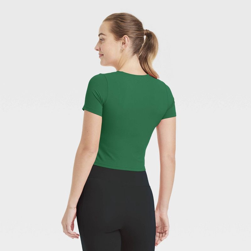 slide 2 of 5, Women's Everyday Soft Cropped Short Sleeve T-Shirt - All In Motion™ Dark Green M, 1 ct