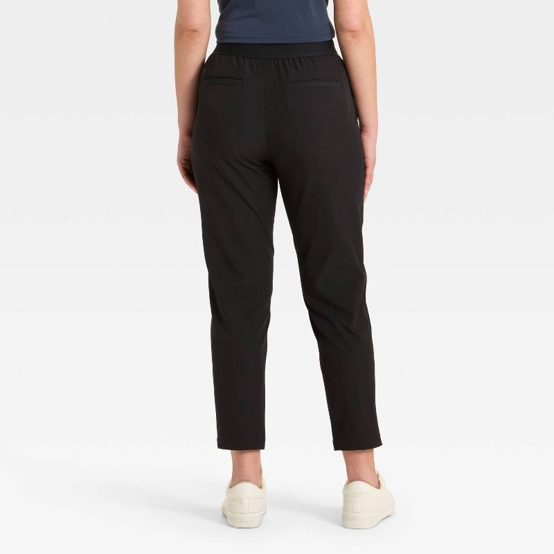 slide 2 of 3, Women's High Rise Golf Pants - All In Motion™ Black L, 1 ct
