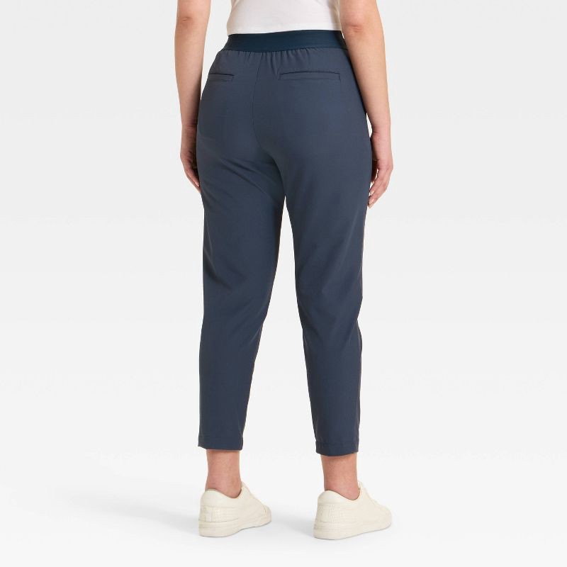 slide 2 of 3, Women's High Rise Golf Pants - All In Motion™ Navy Blue XS, 1 ct