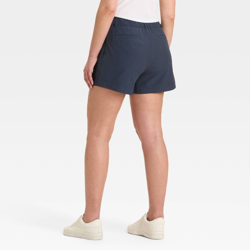 slide 2 of 3, Women's 4" Woven High Rise Golf Shorts - All In Motion™ Navy Blue L, 1 ct