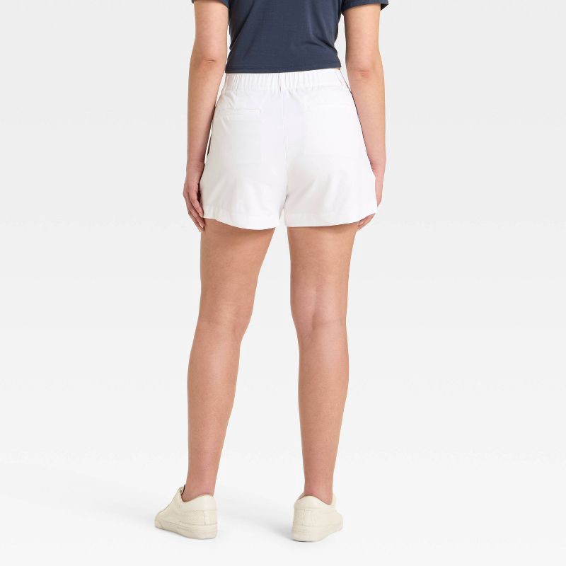 slide 2 of 3, Women's 4" Woven High Rise Golf Shorts - All In Motion™ White XS, 1 ct