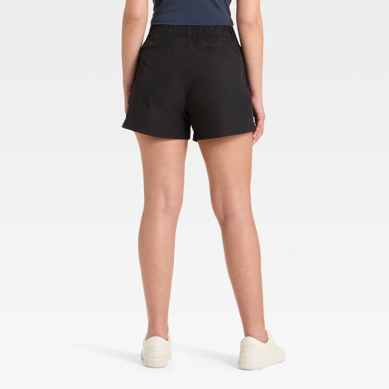 slide 2 of 3, Women's 4" Woven High Rise Golf Shorts - All In Motion™ Black XS, 1 ct