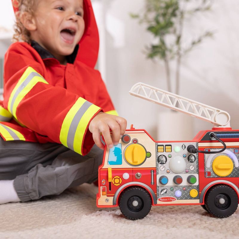 slide 6 of 9, Melissa & Doug Lights & Sounds Fire Truck Activity Board, 1 ct
