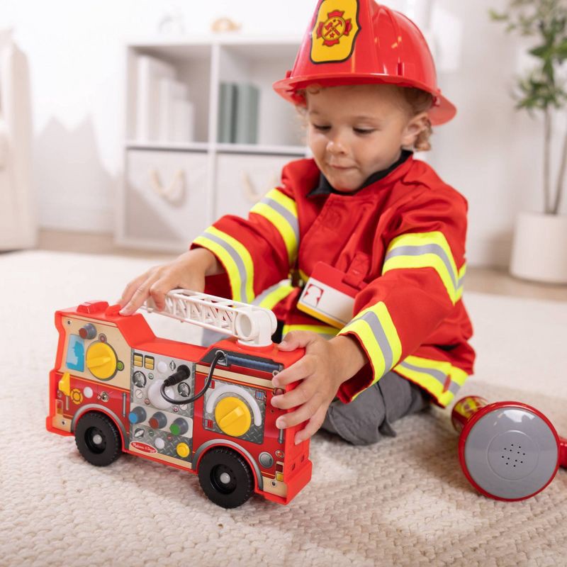 slide 7 of 9, Melissa & Doug Lights & Sounds Fire Truck Activity Board, 1 ct