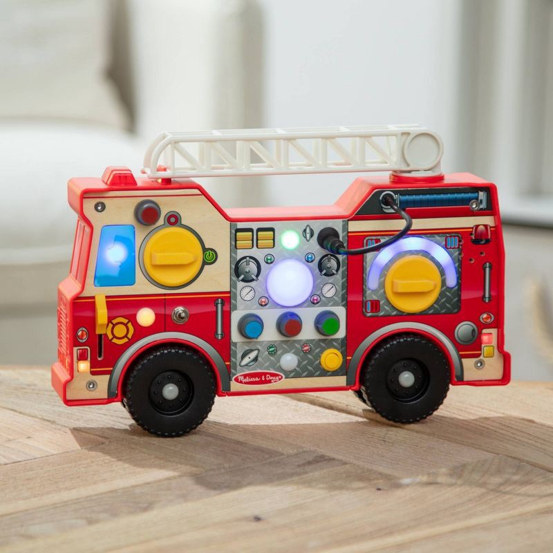 slide 9 of 9, Melissa & Doug Lights & Sounds Fire Truck Activity Board, 1 ct