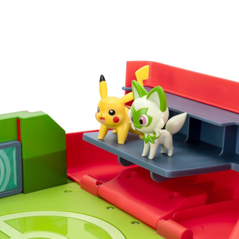 slide 6 of 20, Pokemon Pokémon Play 'N' Display Case with Pikachu & Sprigatito Action Figure, 1 ct