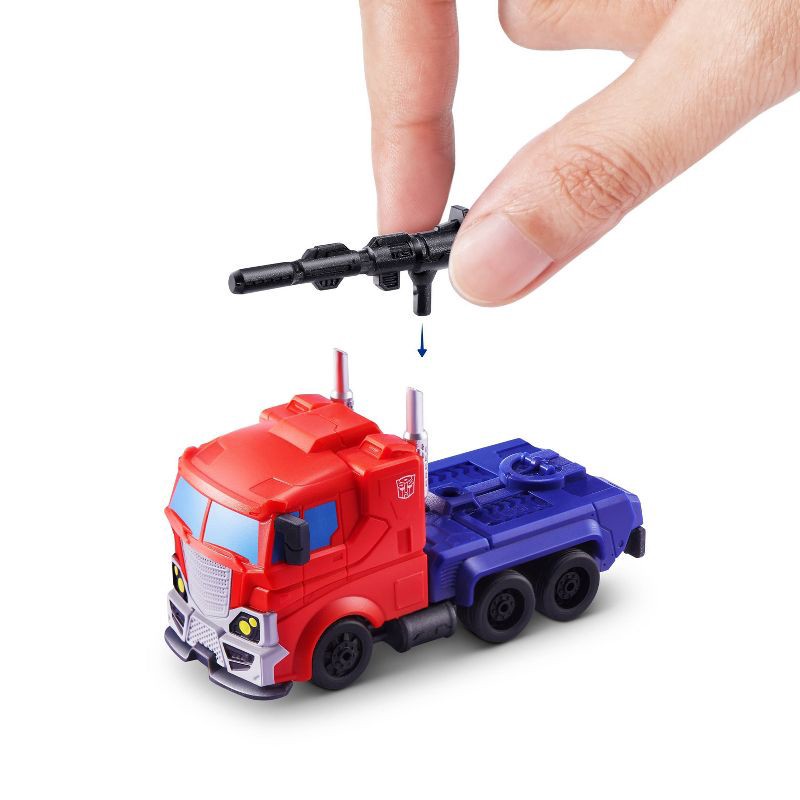 slide 5 of 9, 5 Surprise Transformers Series 1 Capsule, 1 capsule