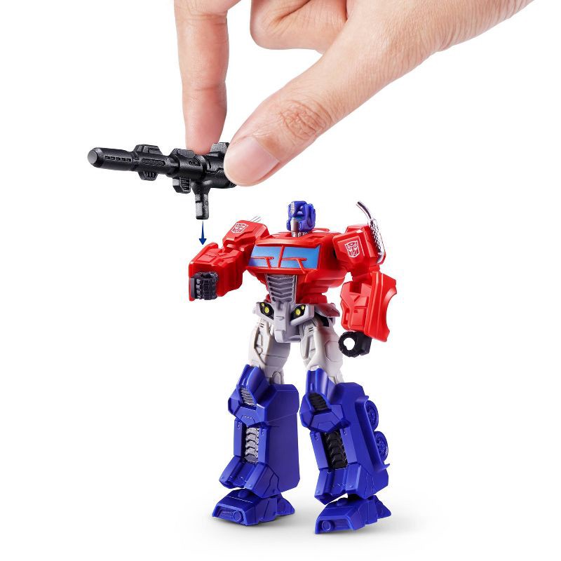 slide 6 of 9, 5 Surprise Transformers Series 1 Capsule, 1 capsule