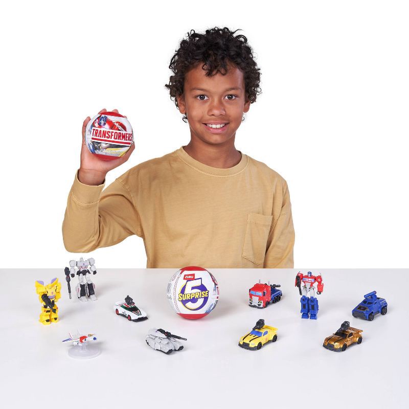 slide 7 of 9, 5 Surprise Transformers Series 1 Capsule, 1 capsule