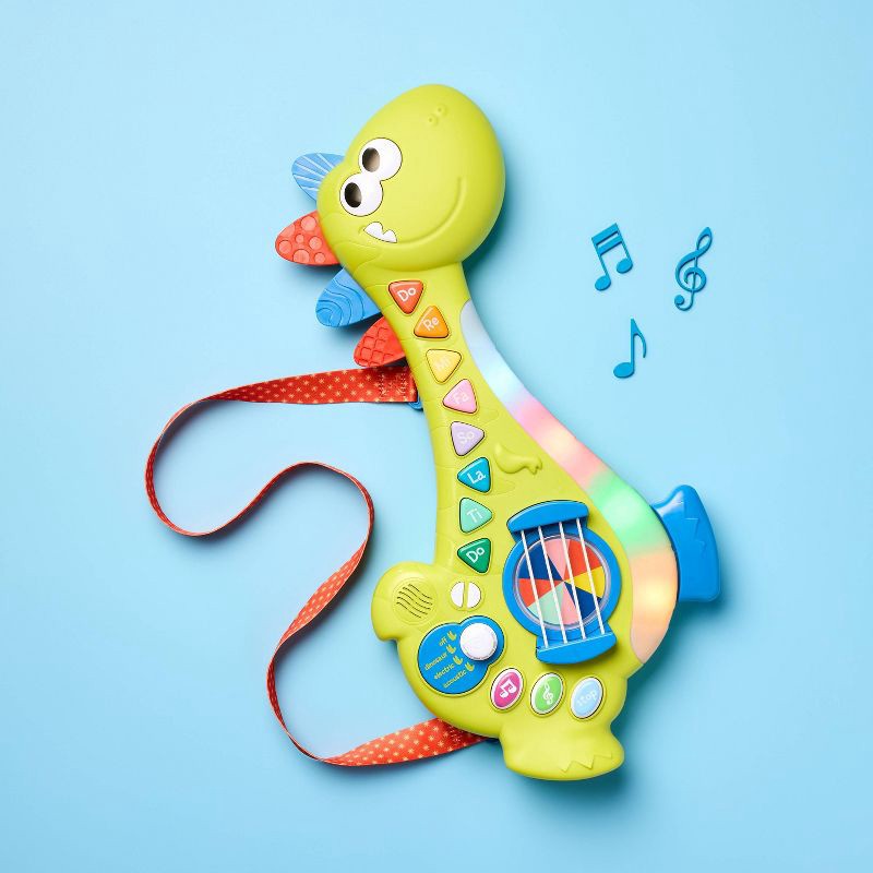 slide 2 of 6, Dino Electronic Guitar - Gigglescape™, 1 ct