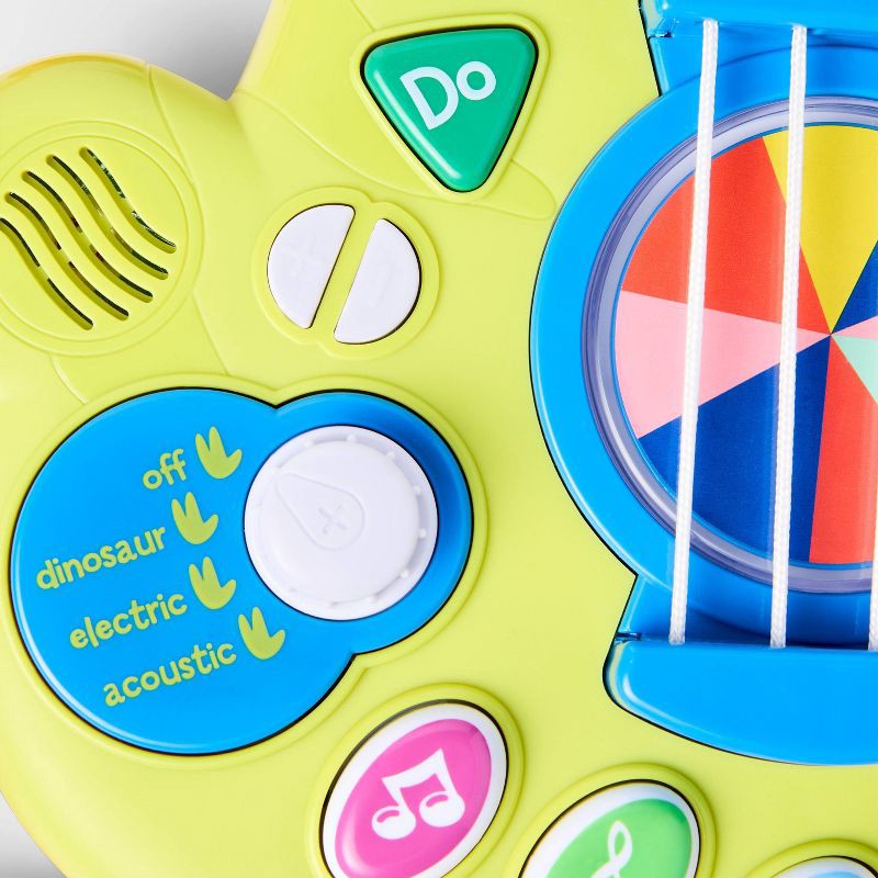 slide 3 of 6, Dino Electronic Guitar - Gigglescape™, 1 ct