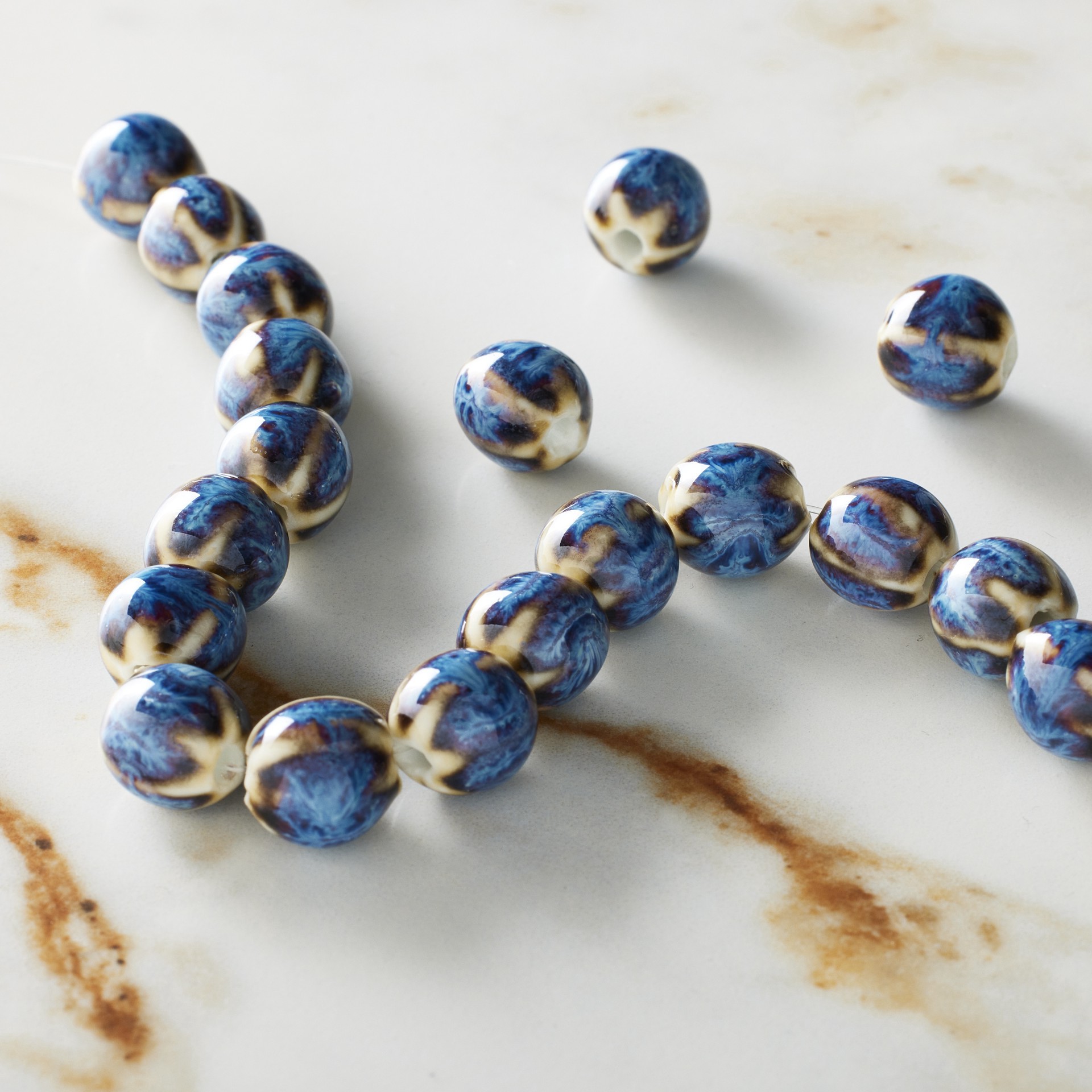 slide 2 of 3, Blue Ceramic Round Melon Beads, 9mm By Bead Landing, 9 mm
