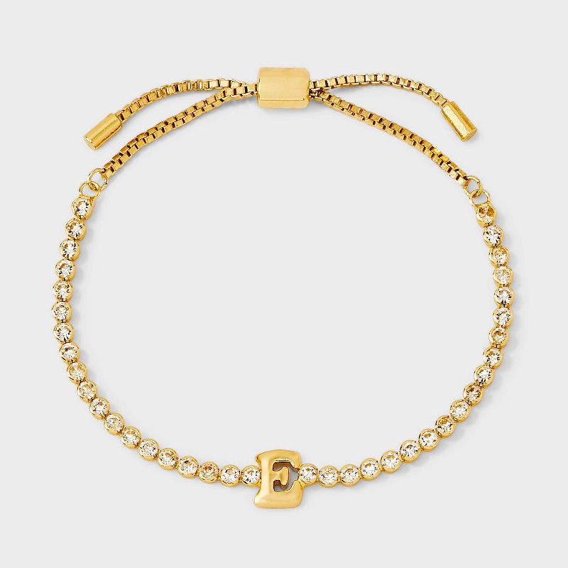 slide 3 of 4, SUGARFIX by BaubleBar Crystal Initial "E" Chain Bracelet - Gold: Brass Stretch Jewelry, Drawstring Closure, 8" Length, 1 ct