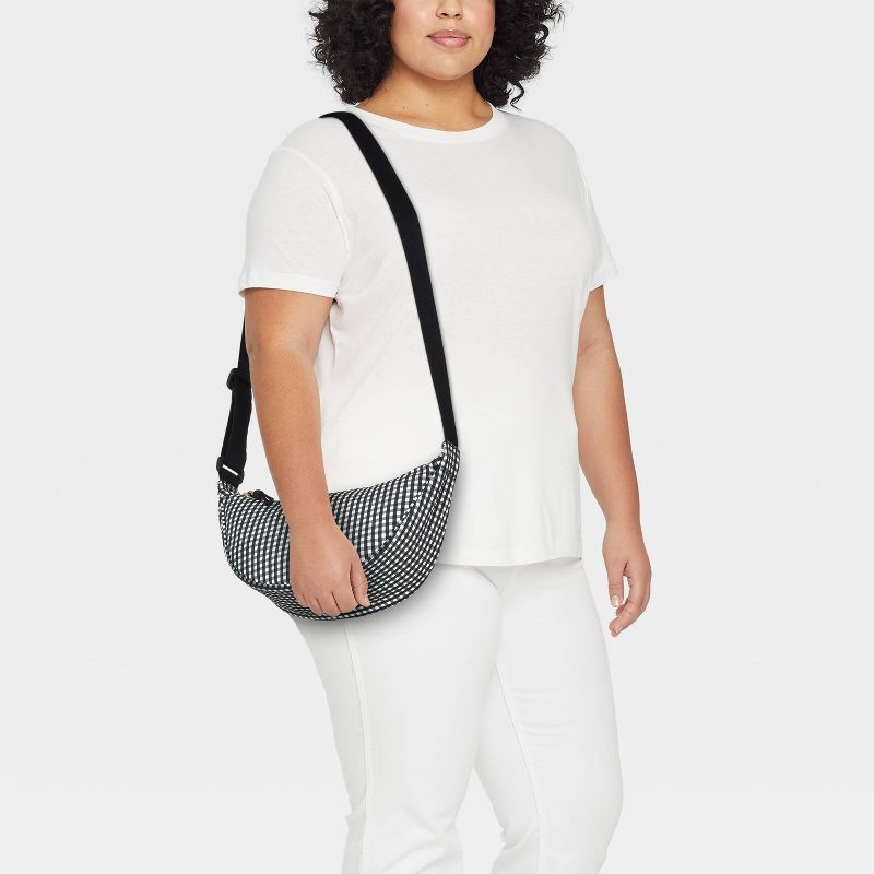 slide 2 of 5, Essential Crescent Sling Crossbody Bag - Universal Thread™ Black/White Gingham, 1 ct