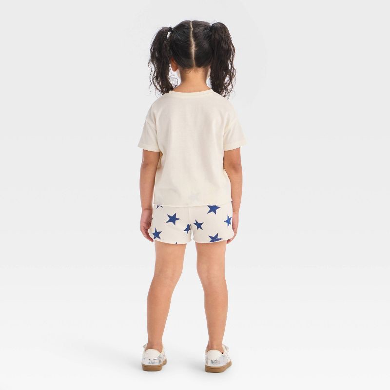 slide 2 of 4, Grayson Mini Toddler Girls' 2pc Americana USA Short Sleeve T-Shirt and Star Shorts Set - Red/White/Blue 18M, 2 ct