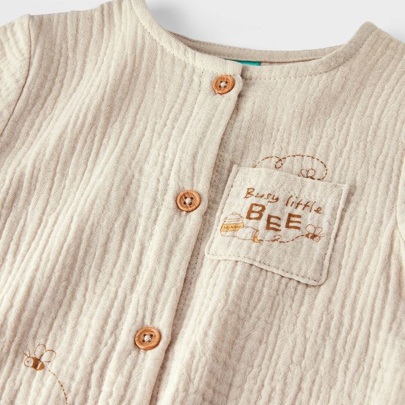 slide 2 of 4, Baby Boys' 2pc Disney Winnie The Pooh Gauze Romper and Hat Set - Oatmeal 0-3M, 2 ct