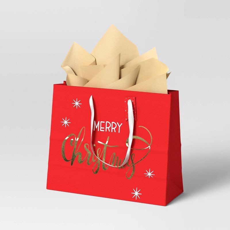 slide 2 of 3, 6ct Tissue and Merry Christmas Large Vogue Christmas Gift Bag Bundle - Wondershop™, 6 ct