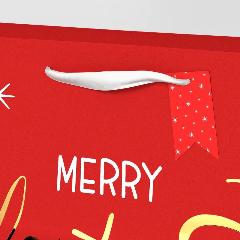 slide 3 of 3, 6ct Tissue and Merry Christmas Large Vogue Christmas Gift Bag Bundle - Wondershop™, 6 ct