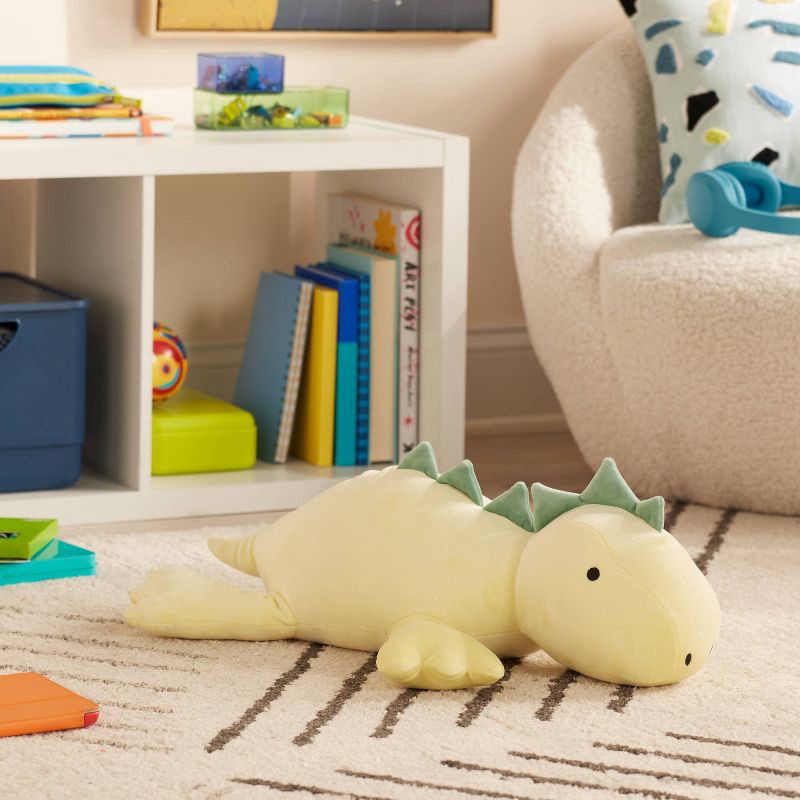 slide 2 of 4, Dinosaur Weighted Plush Kids' Throw Pillow Yellow - Pillowfort™, 1 ct