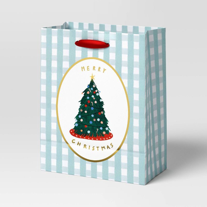 slide 1 of 3, Merry Christmas Tree on Plaid Cub Christmas Gift Bag - Wondershop™, 1 ct