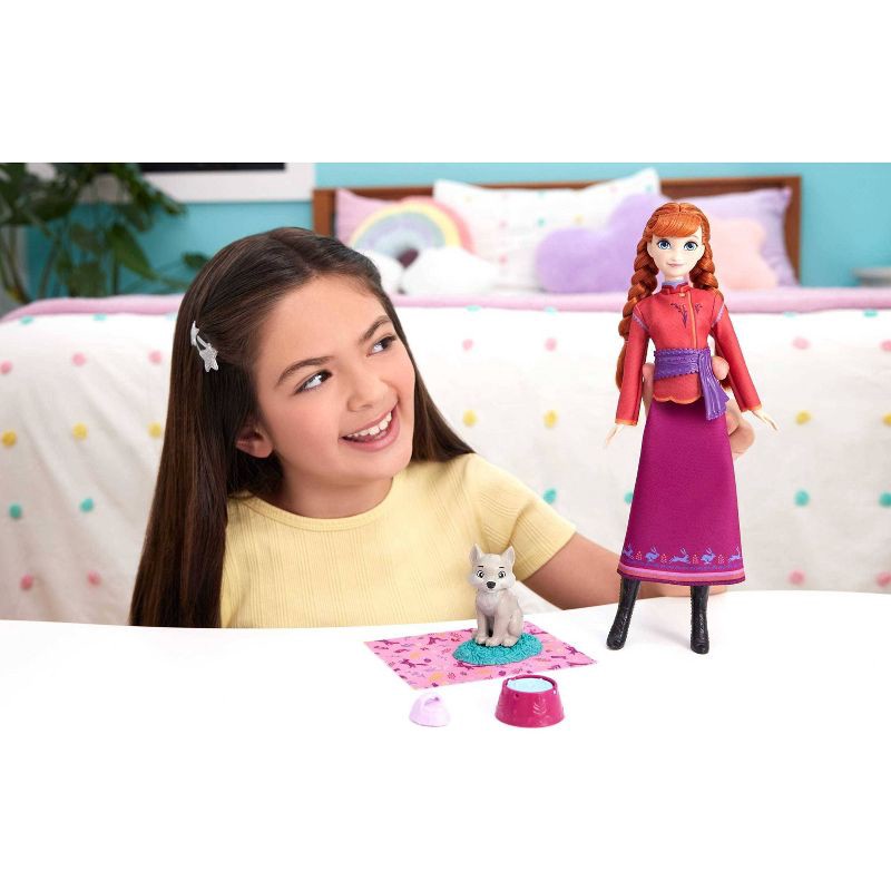 slide 2 of 6, Disney Frozen Anna Fashion Doll & Wolf Cub Figure with 4 Nurturing Accessories Inspired by Movie, 1 ct